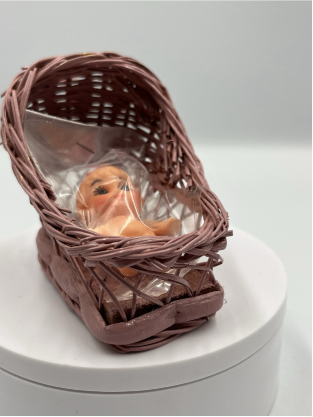 Vintage PINKWicker/ Woven Doll Bassinet Bed WITH VTG KEWPIE/CUPIE BABY NIP SEE